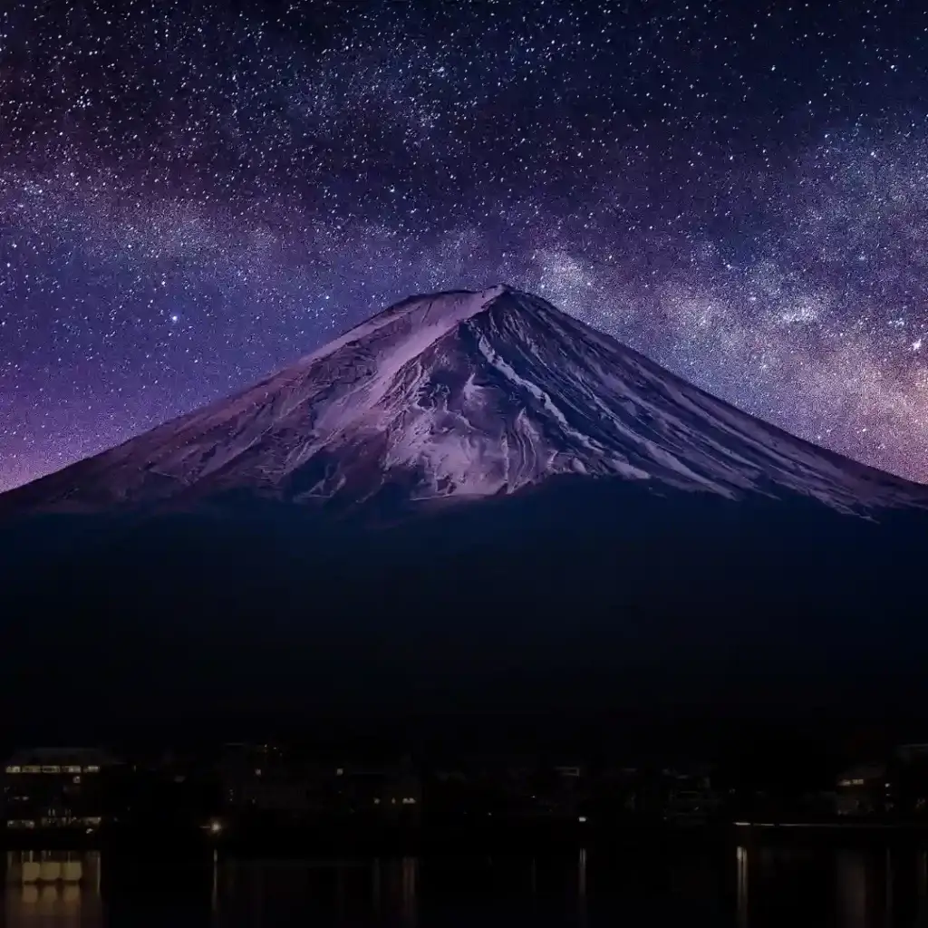 Mount Fuji under a starry night sky with the Milky Way, ideal for nature and astronomy lovers in Delhi, Gurgaon, and Noida