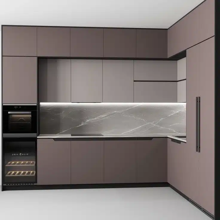 Modern kitchen with matte brown cabinets, a marble backsplash, and built-in appliances including an oven and wine cooler. Sleek design with hidden lighting.